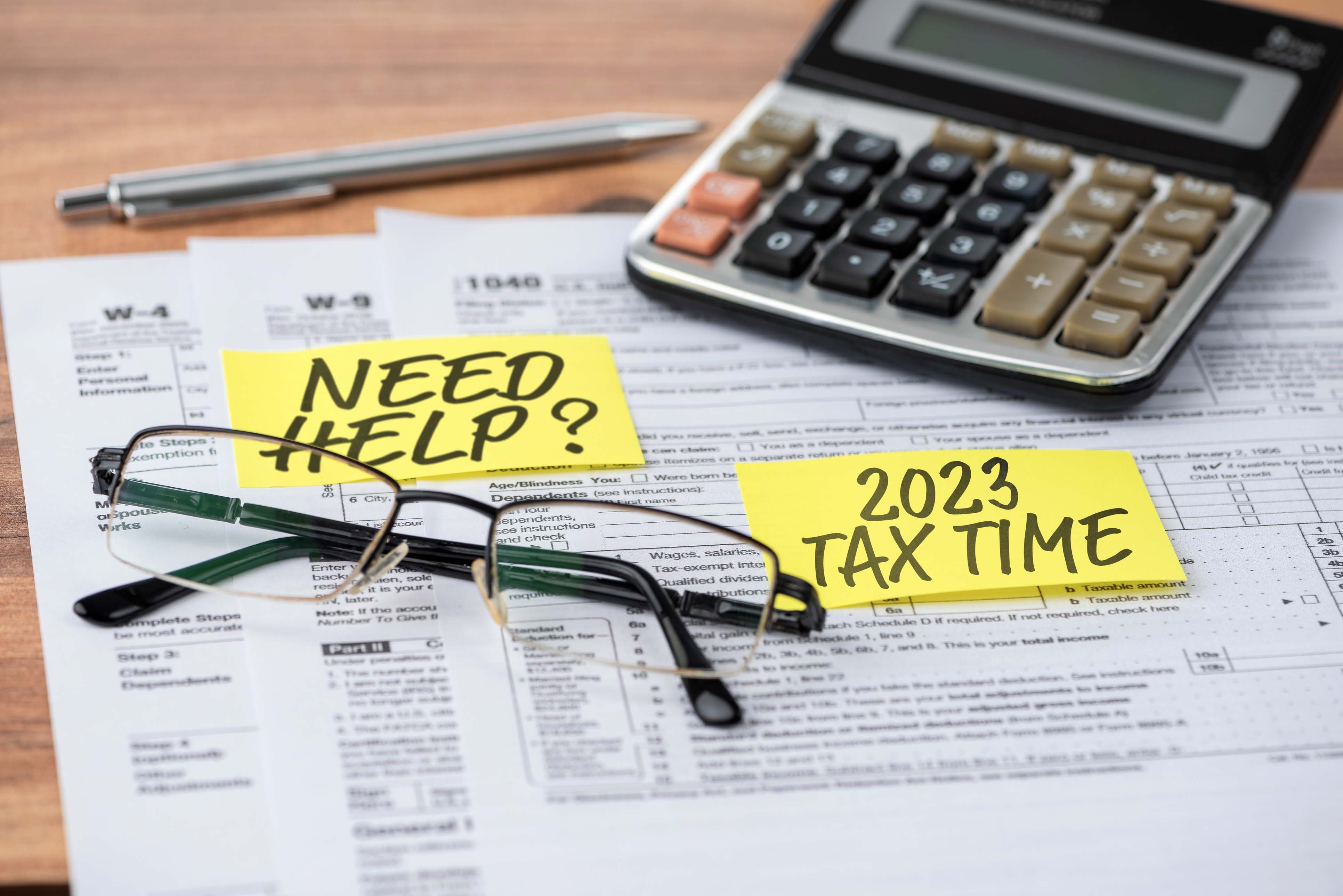2020 TAX TIME and NEED HELP note on tax forms. Tax concept