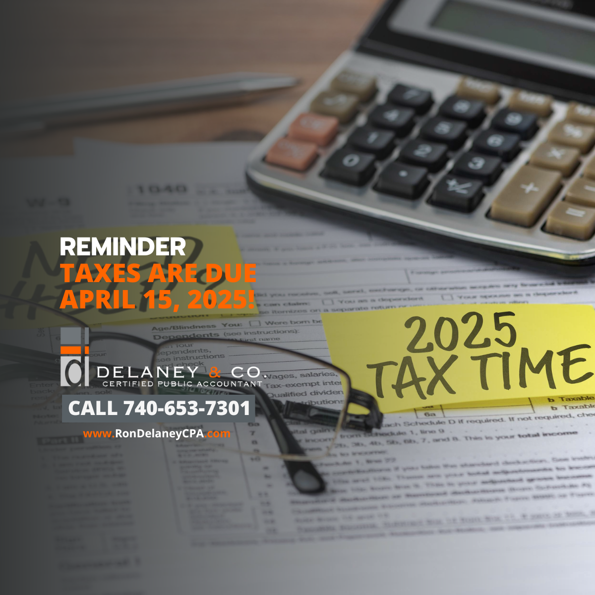 Tax forms, glasses and a calculator with a note reading 2025 tax time